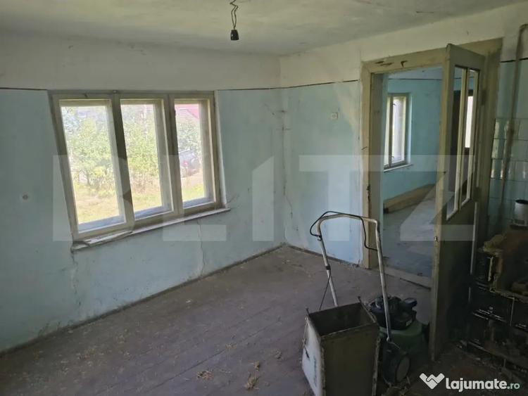 Casă cu 2 camere cu Teren 1200 Mp în Nord