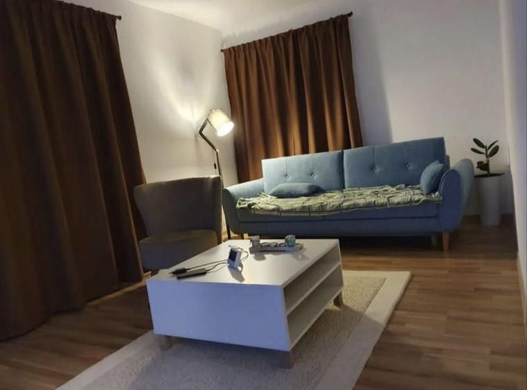 Apartament cu 2 camere semidecomandat, mobilat în Bună Ziua