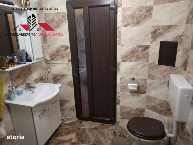 Casă cu 4 camere în Ampoița