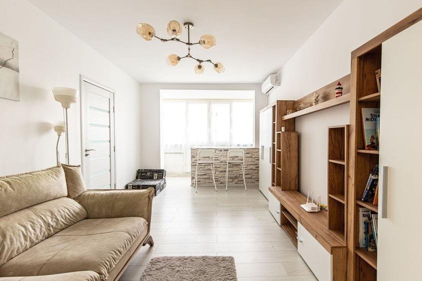 Apartament cu 3 camere semidecomandat în Dorobanți
