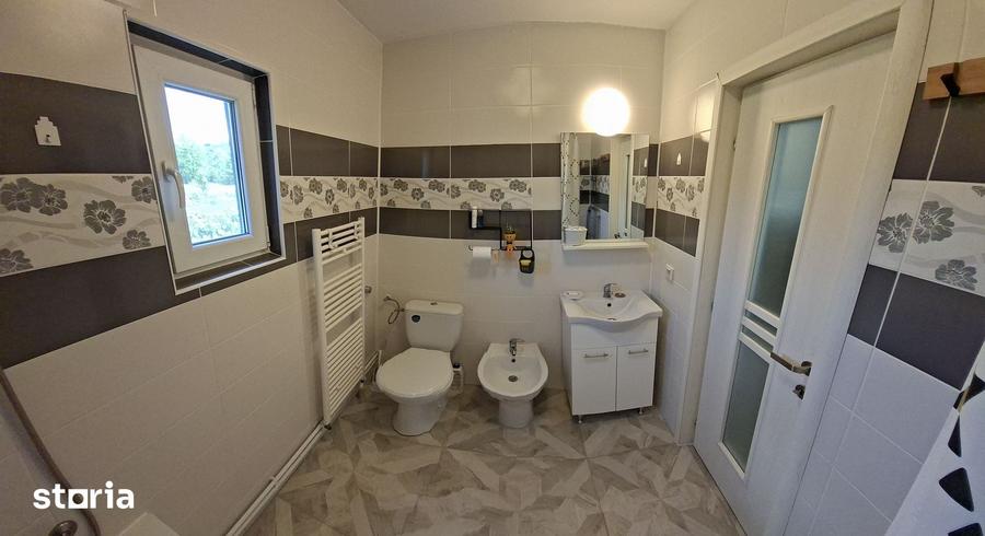 Casă cu 2 camere cu Teren 1350 Mp în Cozma