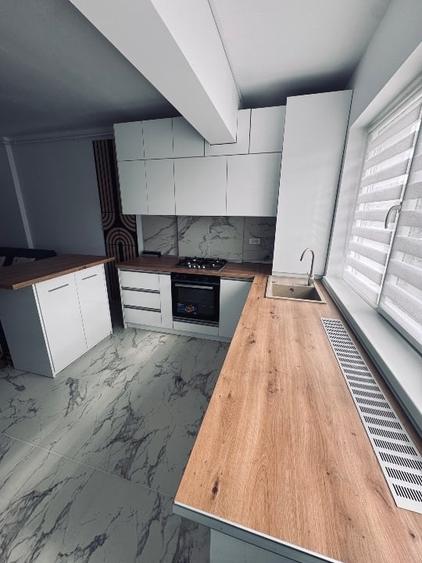 Apartament cu 2 camere semidecomandat, mobilat în Central