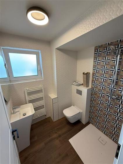Apartament cu 3 camere decomandat în Tractorul