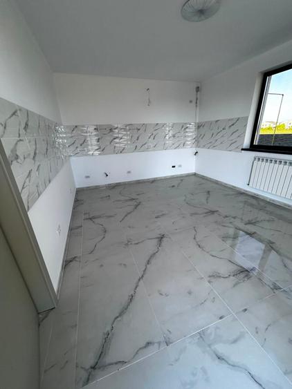 Casă individuală cu 5 camere cu Teren 500 Mp în Balotești