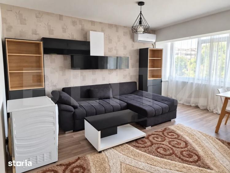 Apartament cu 3 camere semidecomandat, mobilat în Nicolina