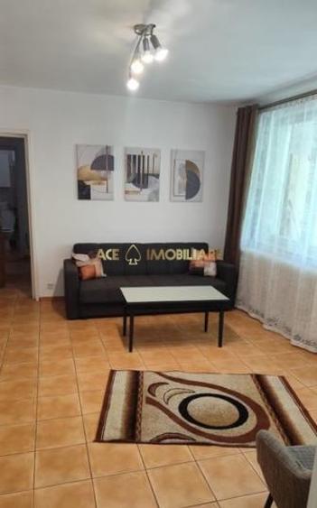 Apartament cu 3 camere semidecomandat, mobilat în Colentina