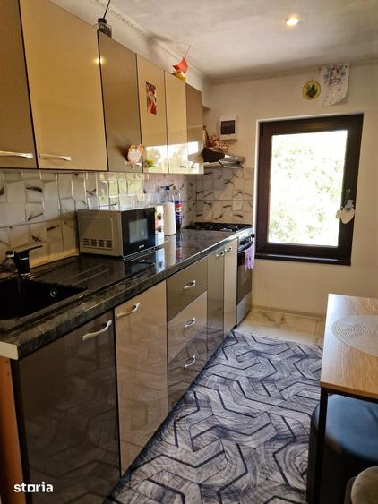 Casă cu 4 camere cu Teren 259 Mp în Comana