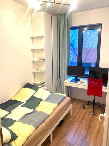 Apartament cu 2 camere semidecomandat, mobilat în Petricani