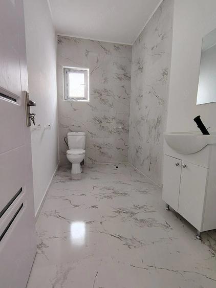 Casă cu Teren 210 Mp în Central