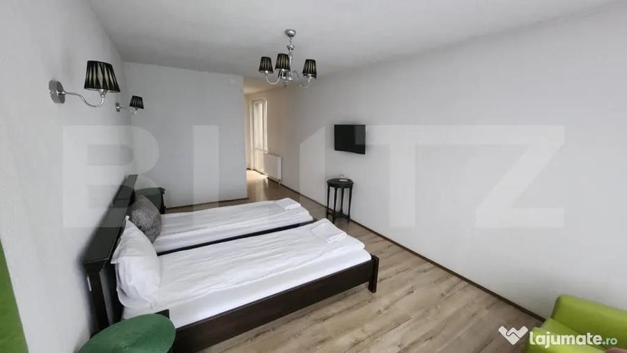 Casă cu 10 camere cu Teren 1100 Mp în Corunca