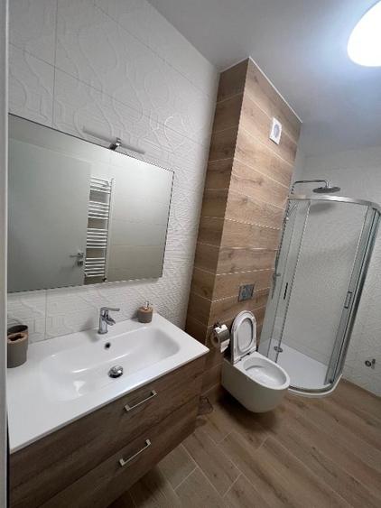 Apartament cu 2 camere semidecomandat, mobilat în Central