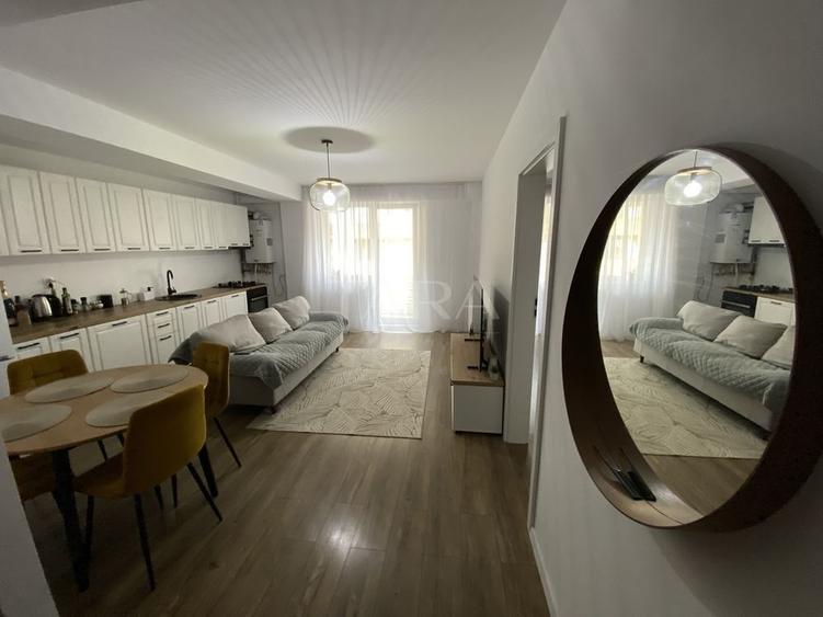 Apartament cu 2 camere semidecomandat, mobilat în Baciu