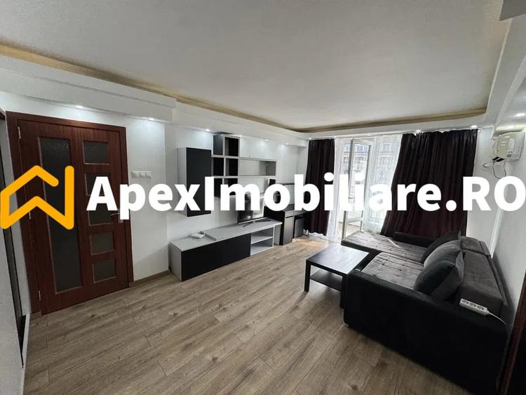 Apartament cu 2 camere semidecomandat, mobilat în P-ța Romană