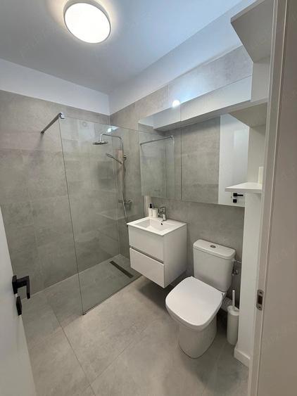 Apartament cu 2 camere semidecomandat în Tunari