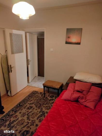 Apartament cu 4 camere decomandat în Podu Roș