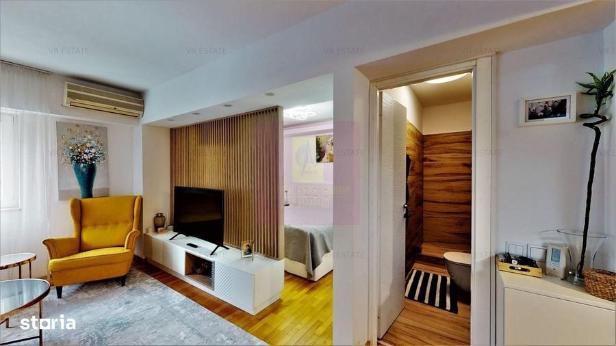 Apartament cu 3 camere în Romană