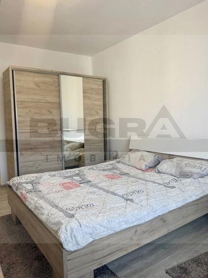 Apartament cu 2 camere semidecomandat, mobilat în Baciu