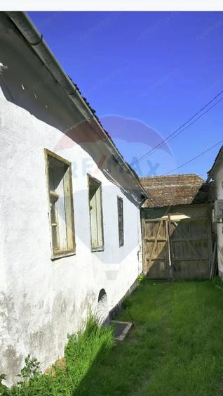Casă cu Teren 1694 Mp în Biertan