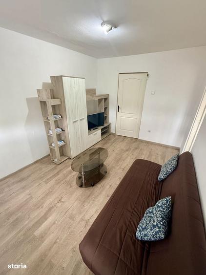 Apartament cu 2 camere semidecomandat, mobilat în Central
