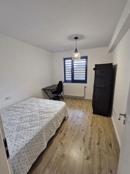 Apartament cu 3 camere decomandat în Tractorul