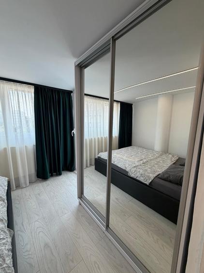 Apartament cu 2 camere semidecomandat, mobilat în Romană