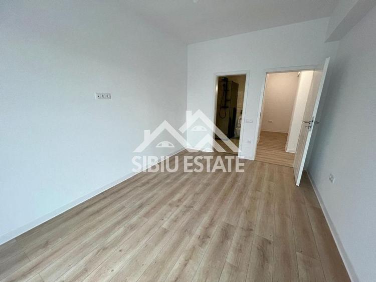 Apartament cu 3 camere decomandat în Șelimbăr — fotografia 2