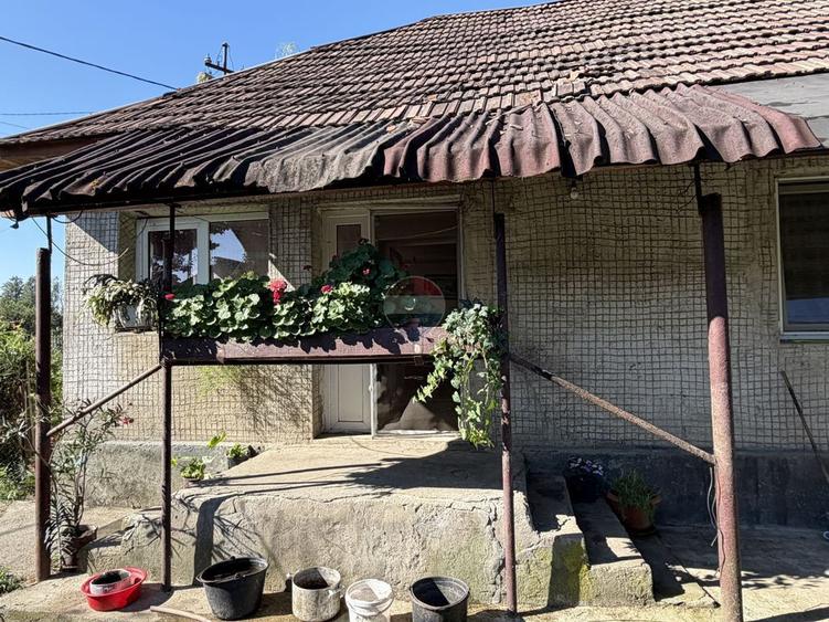 Casă cu 2 camere cu Teren 1500 Mp în Bârgău