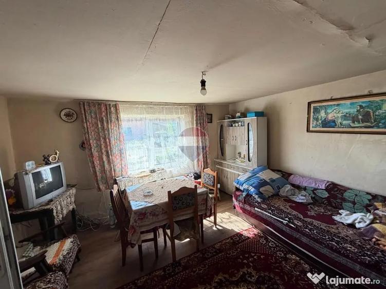 Casă cu 2 camere cu Teren 1500 Mp în Bârgău