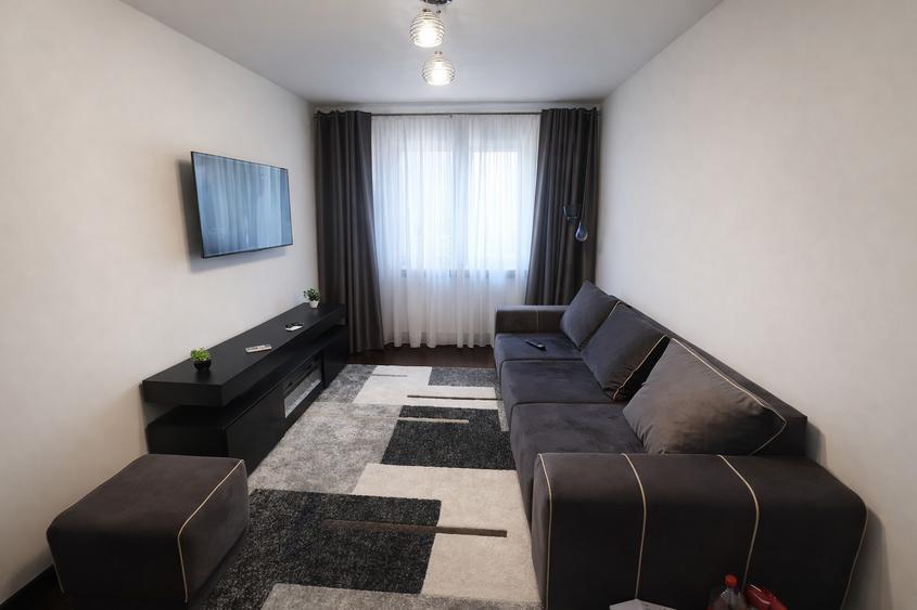 Apartament cu 2 camere semidecomandat, mobilat în Podu Roș
