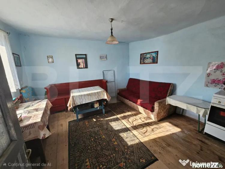 Casă cu 4 camere cu Teren 1000 Mp în Sâncel