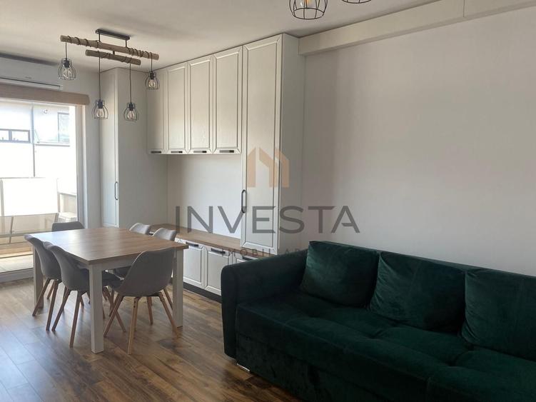 Apartament cu 3 camere semidecomandat, mobilat în Borhanci