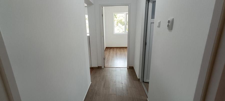 Apartament cu 3 camere semidecomandat, mobilat în Nord