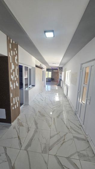 Casă cu 3 camere în Poarta Albă