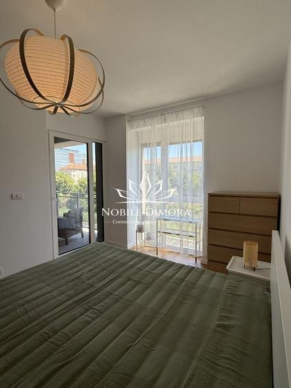 Apartament cu 2 camere semidecomandat, mobilat în Central