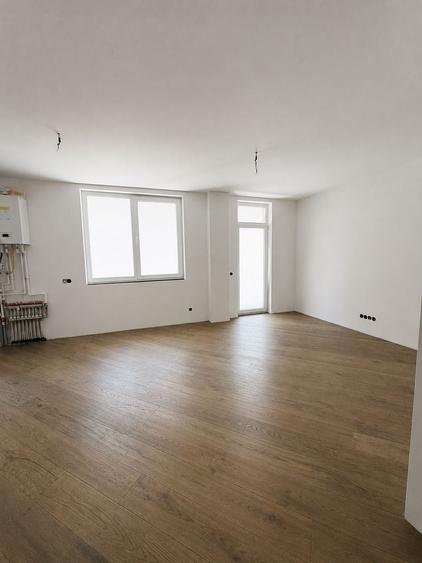 Apartament 3 camere, 2 bai, etaj intermediar, balcon, garaj, boxa - 1