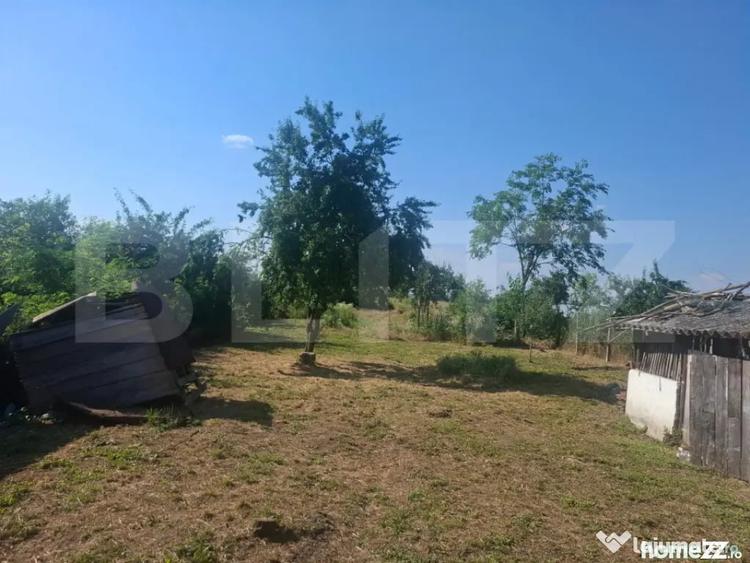 Casă cu 2 camere cu Teren 5000 Mp în Mogoșani