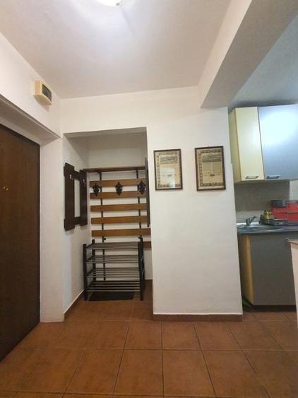 Apartament cu 3 camere nedecomandat, mobilat în Baba Novac