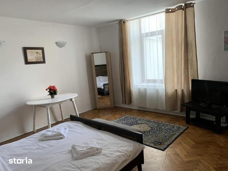 Apartament cu 2 camere semidecomandat, mobilat în Centrul Istoric