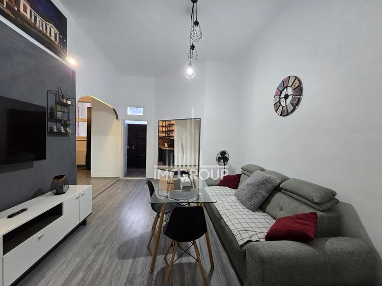Apartament cu 3 camere semidecomandat, mobilat în Central