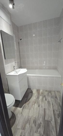 Apartament cu 3 camere decomandat în Cățelu