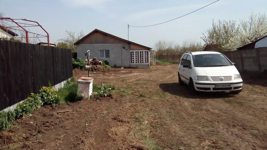 Casa si 5800 mp teren intravilan in Rosiori de Vede - 1