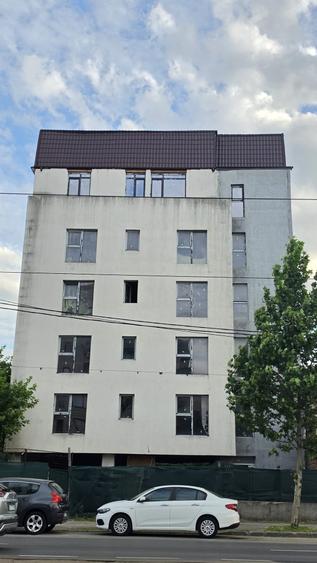 Apartament cu 34 camere decomandat în Chitila