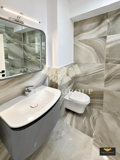 Apartament cu 3 camere decomandat în Polonă