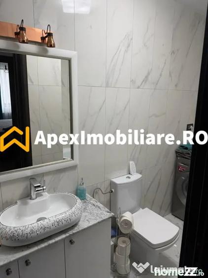 Apartament cu 4 camere decomandat în Titan