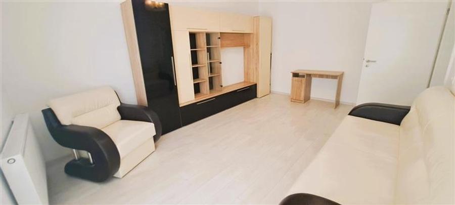 Apartament 2 camere, etaj 2, mobilat si utilat . Zona Tractorul - 11