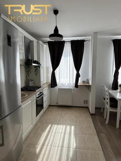 Apartament cu 2 camere semidecomandat, mobilat în Tractorul