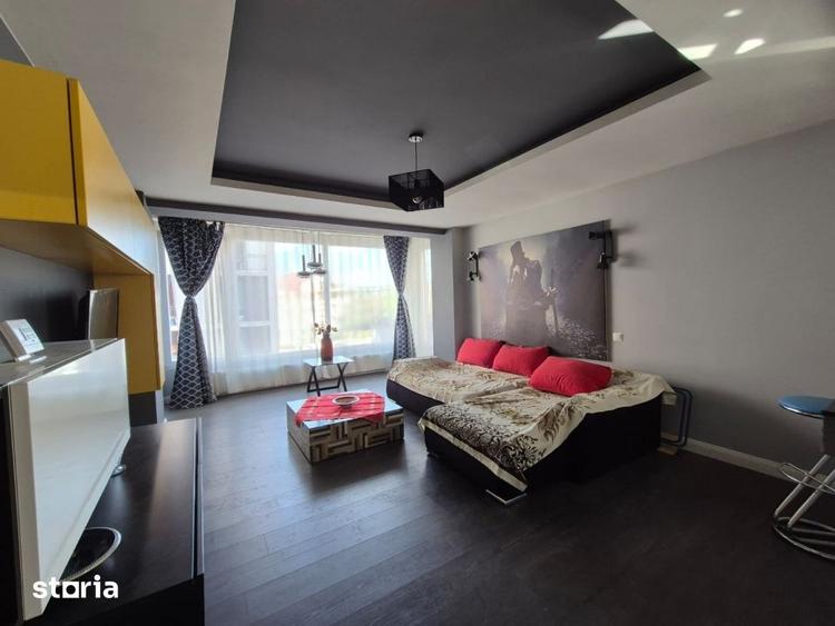 Apartament cu 2 camere semidecomandat, mobilat în Borhanci