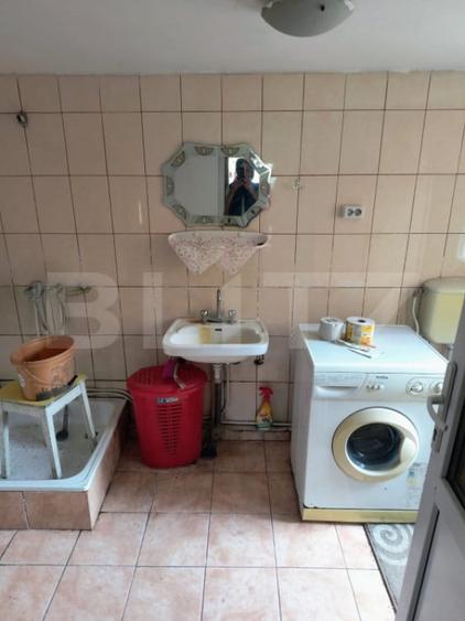 Casă cu 2 camere cu Teren 1400 Mp în Central