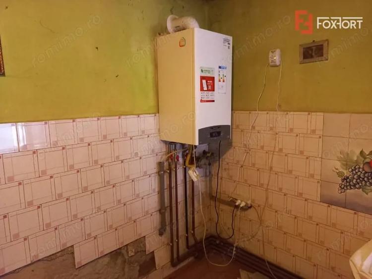 Casă cu 6 camere cu Teren 489 Mp în Plopi