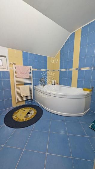 Casă individuală cu 6 camere cu Teren 500 Mp în Calea Moldovei
